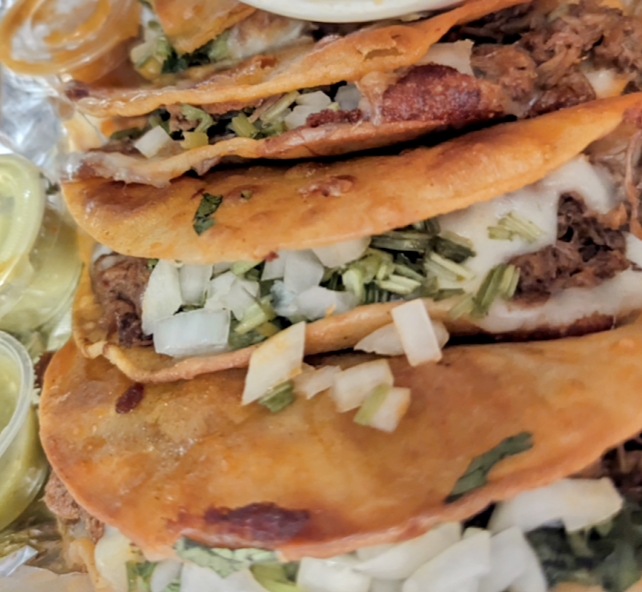 Birria & Barbacoa de Chivo Los Compadres signature dishes Birria TacosStreet TacosQuesobirria